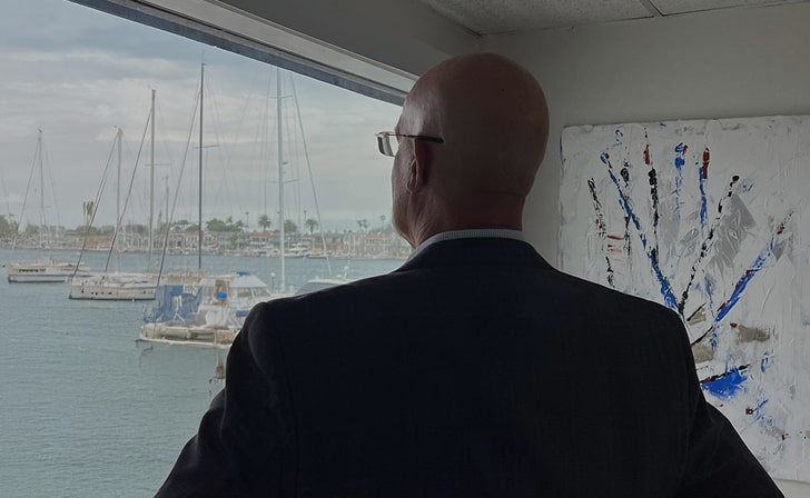 Kirk Robinson looking out a window